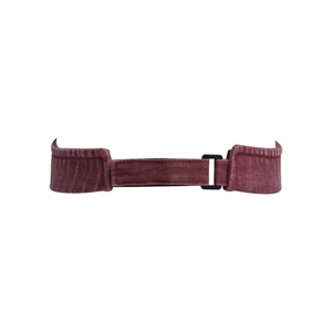 Close-up of the adjustable back strap with black plastic buckle on a burgundy sun visor