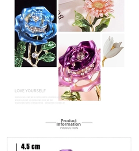 Detailed view of rose flower brooches in multiple colors with enamel and crystals