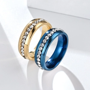 Polished titanium steel ring with single row of cubic zirconia in gold and blue finish