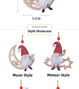 Detail view of moon and meteor shaped wooden Christmas gnomes with red polka dot hats
