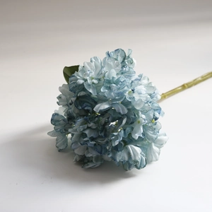 Macro shot of blue gradient silk hydrangea petals with realistic vintage burnt edges