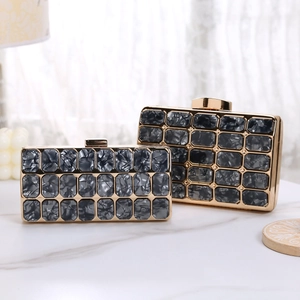 Elegant marble acrylic evening clutch bag with gold metal frame in two sizes for weddings