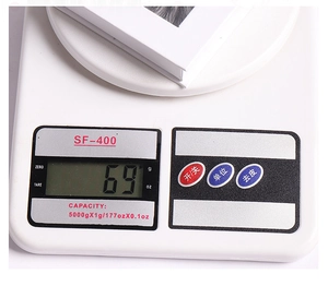 Macro view of SF-400 digital scale showing product weight for precise shipping measurements