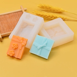 Silicone mold for 3D gift boxes with bow and flower details for DIY resin crafts