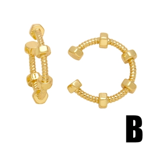 Minimalist C-shape gold ear cuff with industrial screw nut design in a polished finish