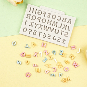 Macro detail of alphabet and number silicone mold with colorful DIY fondant letters