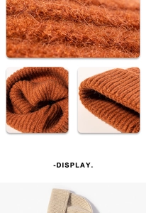 Dettaglio della trama del cappello di lana spessa a coste color caramello e beige