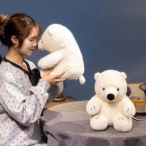 Cute white polar bear plush toy in sitting pose, soft and realistic stuffed animal