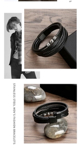 Detail of multi-layer black braided leather bracelet with stainless steel beads and magnet clasp