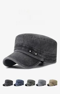 Detail view of washed cotton cadet hat with metal rivet strap and curved brim