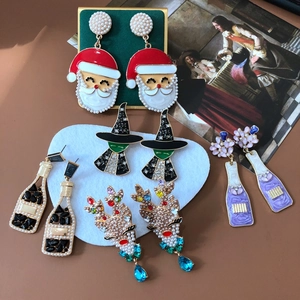 Festive Christmas earrings collection with pearls, rhinestones and enamel holiday motifs
