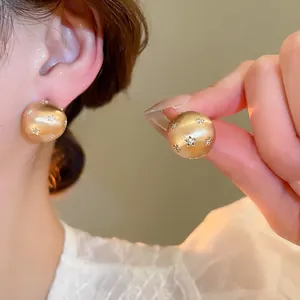 18k gold plated brushed sphere stud earrings with crystal star patterns for women