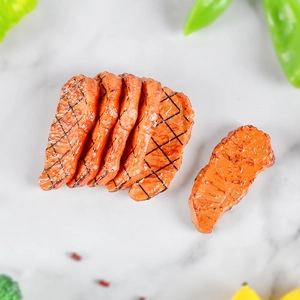 Realistic PVC mini roasted beef slices model set with grill marks on marble background
