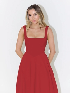 Detail of red square neck sleeveless dress with A-line silhouette and slim waist fit
