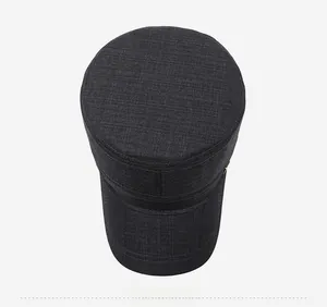 Top view of dark grey flat top military cap showing the circular crown and twill texture