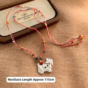 Ethnic style woven necklace with colorful beads and white puppy pendant, length 115cm