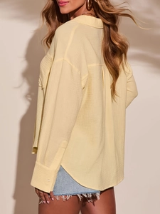 Camisa informal de algodón amarillo claro con mangas largas y textura de nido de abeja