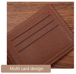 Close-up of brown pebbled leather wallet with orange stitching and multi card slots