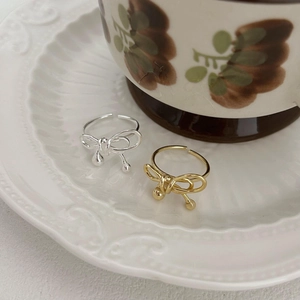 925 sterling silver bow open rings in gold and silver finish with dangling bead charms
