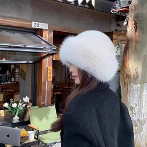 Chic white faux fur bucket hat for women with thick plush design for winter warmth