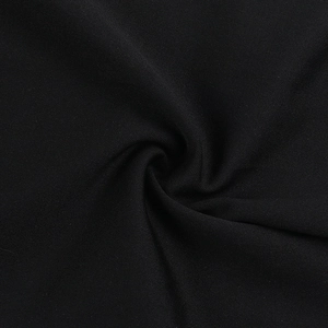 Detailed macro view of black knit fabric texture showing breathable material density