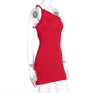 Close-up of red bodycon dress featuring detailed braided trim on the one-shoulder neckline