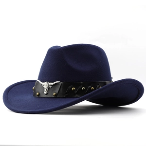 Close-up of navy wool felt cowboy hat featuring black leather band and silver bull head icon
