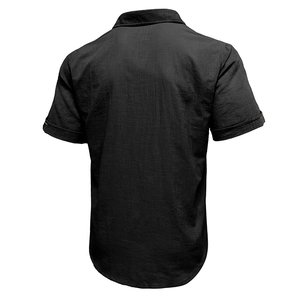 Back view of black cotton linen beach shirt showing textured fabric and curved hem