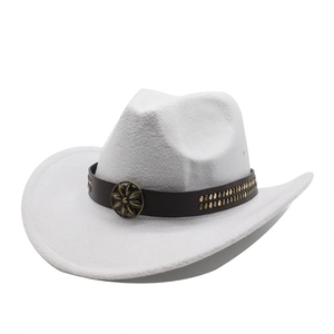 Detailed macro view of white wool felt cowboy hat with leather band and bronze metal buckle