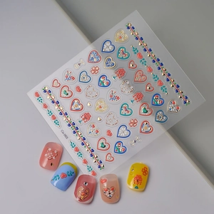 Valentine's heart and floral embossed nail art stickers with gold foil and 3D effect