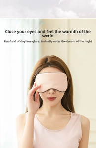 Close-up of pink silk sleep mask on model, showing soft texture and light-blocking fit