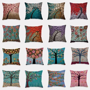 Detail showing various artistic tree and floral patterns on linen square pillow covers
