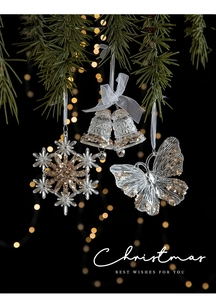 Sparkling transparent Christmas tree ornaments with gold sequins hanging on pine branch