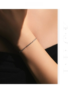 Detailed view of 925 sterling silver thin bracelet featuring full sparkling pave cubic zirconia