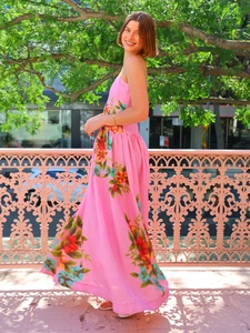 Detail of pink floral print summer maxi dress with thin straps and open back design