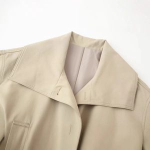 Classic khaki trench coat for women featuring a detailed lapel collar and high-density cotton