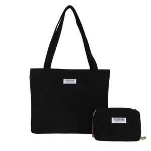 Large black corduroy tote bag set with matching zipper pouch and white fashion label