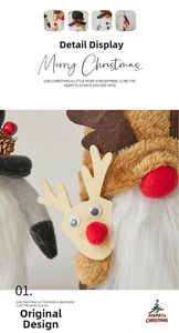 Close-up of handmade Christmas gnome with reindeer ears and soft plush texture