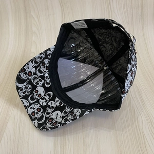 Detail view of the interior 100% polyester wash label and skull print pattern