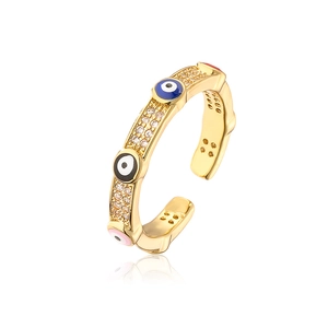 Detailed view of gold plated open ring with multi-color enamel evil eye and pavé zircons