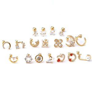 Mix of minimalist stainless steel stud earrings with moon, star, and zircon details