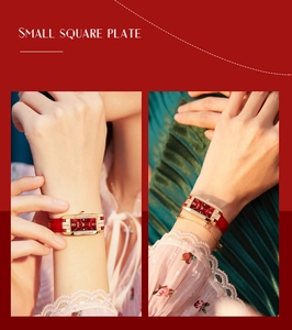Detail view of a square quartz watch with red leather strap and side crystal accents