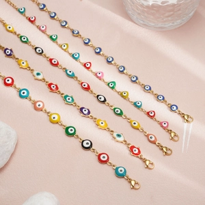 Gold stainless steel Evil Eye and Hamsa Hand charm bracelets with colorful enamel accents