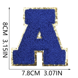 Detailed view of royal blue chenille letter A patch with gold glitter edge and dimensions