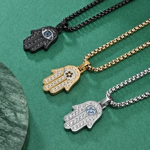 Three-color Hamsa hand necklaces in gold, silver and black with micro-paved cubic zirconia