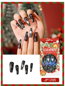 Detailed Christmas press-on nails set with black coffin shape, reindeer and snowflake prints