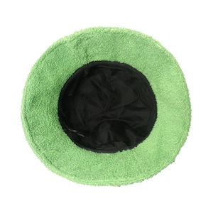 Top view of green sherpa frog bucket hat showing soft fleece texture and black lining