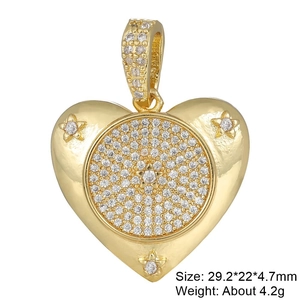 Detailed view of gold-plated copper heart pendant with white cubic zirconia inlay
