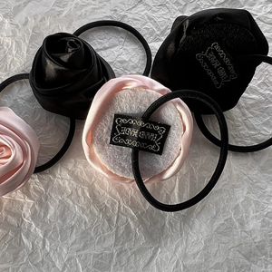 Elegant satin rose hair ties in black and pink with high elasticity and handmade labels