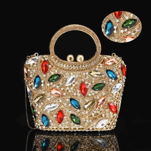 Macro detail of luxury evening clutch with sparkling rhinestones and colorful crystals